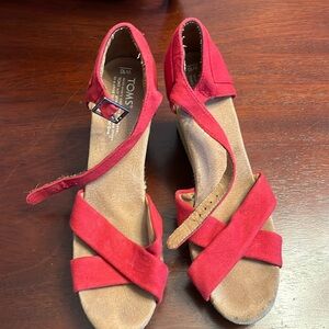 Tom’s red wedge sandals